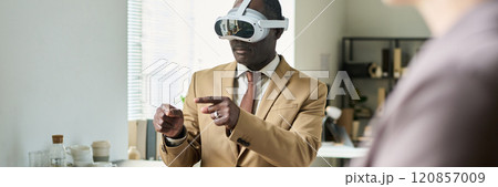 Mature man in virtual reality headset Mature man in virtual reality headset 120857009