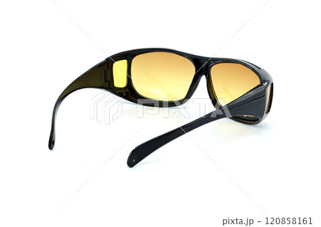 Classic Black Sunglasses With Stylish Yellow Tinted Lenses on White Background 120858161