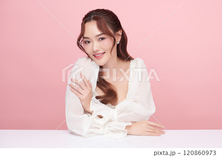 Beautiful young asian woman with clean fresh skin on pink background, Face care, Facial treatment, Cosmetology, beauty and spa, Asian women portrait. 120860973