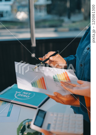 ESG environmental social governance display on laptop on eco-friendly company meeting with business people implementing environmental protection for clean and sustainable future ecology. Trailblazing 120861300