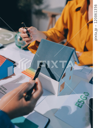 ESG environmental social governance display on laptop on eco-friendly company meeting with business people implementing environmental protection for clean and sustainable future ecology. Trailblazing 120861356