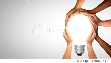 Symbols and shapes of light bulbs created by hand. People thinking together and team ideas coming together joining hands. 120861417