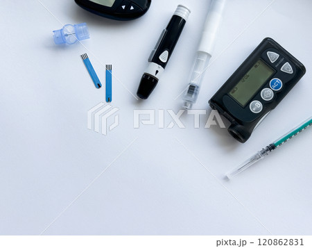 Essential diabetes management tools on white background 120862831