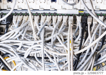 close-up of ethernet cables and switch 120863777