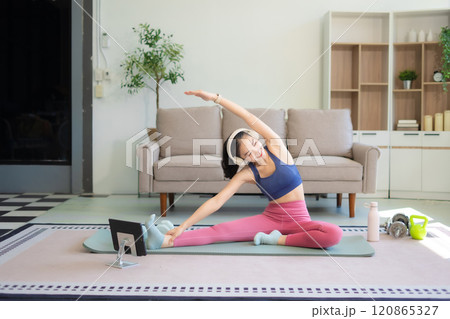 fitness ,workout, home exercise ,lifestyle and healthy concept.Woman in exercise gear. fitness ,workout, home exercise ,lifestyle and healthy concept.Woman in exercise gear. 120865327
