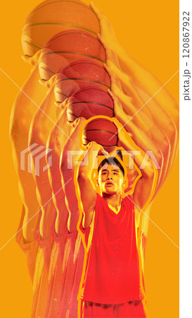 Basketball player preparing to shoot, holding ball high, on vibrant yellow background. Stroboscopic effect highlights phases of motion, emphasizing focus and precision. Basketball player preparing to shoot, holding ball high, on vibrant yellow background. Stroboscopic effect highlights phases of motion, emphasizing focus and precision. 120867922