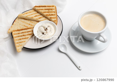 Homemade grilled toasts for breakfast with a cup of black coffee. Homemade grilled toasts for breakfast with a cup of black coffee. 120867990