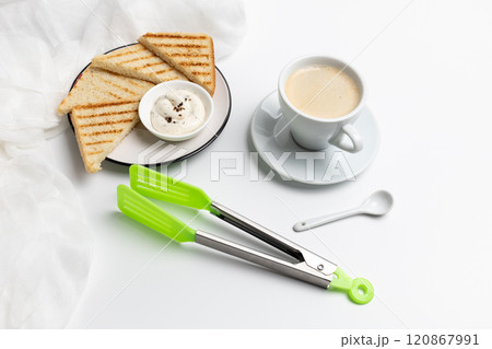 Homemade grilled toasts for breakfast with a cup of black coffee. 120867991