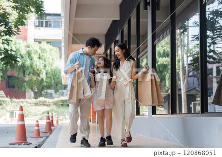 Joyful Family Shopping Experience with Parents and Children Enjoying a Day Out in the City Joyful Family Shopping Experience with Parents and Children Enjoying a Day Out in the City 120868051