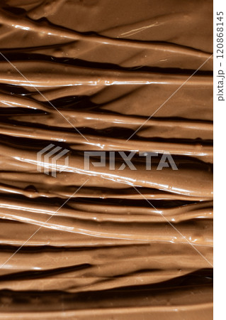 Macro Texture Natural Melted Milk Chocolate Top View 120868145