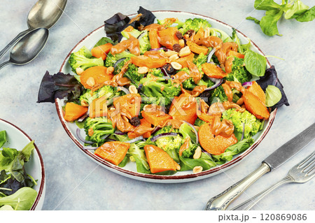 Healthy homemade broccoli salad with roasted sweet potato. 120869086