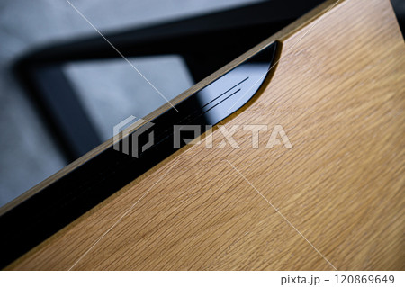 Empty rough wooden table top in the dark room 120869649