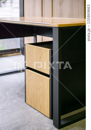 Empty rough wooden table top in the dark room Empty rough wooden table top in the dark room 120869663
