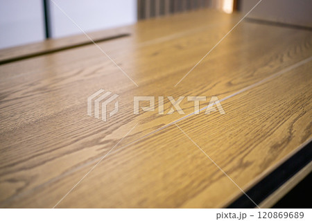 Empty rough wooden table top in the dark room 120869689