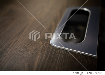 Empty rough wooden table top in the dark room 120869703