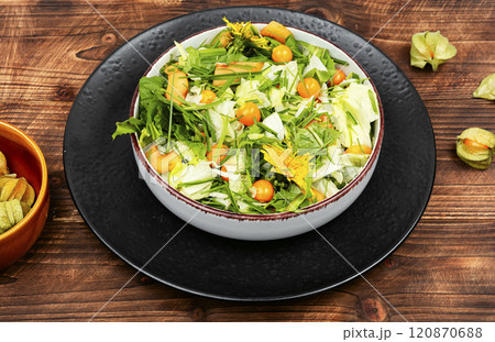 Salad with physalis and field grass Salad with physalis and field grass 120870688