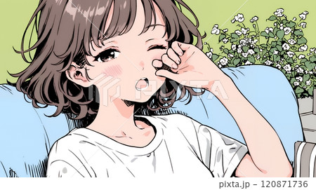 あくびをしている若い女性