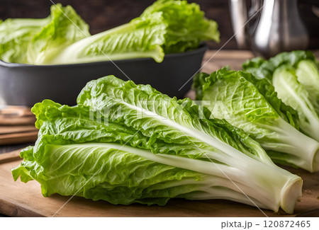 Fresh napa cabbage placed on a wooden chopping board ready for preparation, showcasing its crisp texture and vibrant green leaves, ideal for healthy delicious meals. AI Generated 120872465