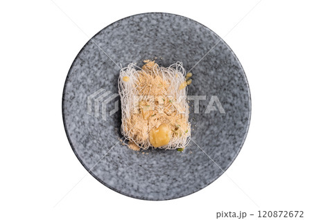 Uncooked dry glass noodles with spicy peanut dressing isolated on white background 120872672