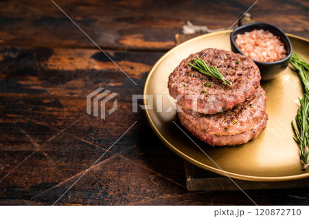 BBQ roasted hamburger chopped meat steaks patties with rosemary. wooden background. top view 120872710