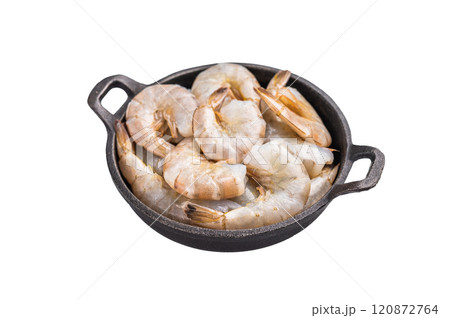 Raw headless white shrimps prawns in a skillet isolated on white background. Raw headless white shrimps prawns in a skillet isolated on white background. 120872764