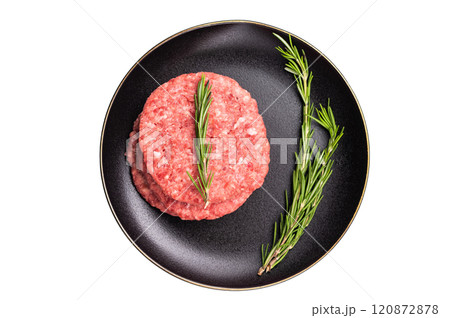 Raw veal and beef minced meat cutlets for burgers with herbs on plate isolated on white background Raw veal and beef minced meat cutlets for burgers with herbs on plate isolated on white background 120872878