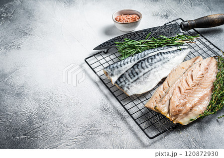 Fresh sliced mackerel fillet fish. White background. Top view. Copy space Fresh sliced mackerel fillet fish. White background. Top view. Copy space 120872930