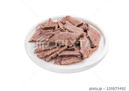 Corned Boiled and sliced beef meat with spices and herbs on a plate isolated on white background Corned Boiled and sliced beef meat with spices and herbs on a plate isolated on white background 120873492