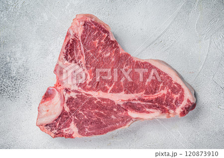 Porterhouse T-bone raw beef meat Steak. White background. Top view 120873910