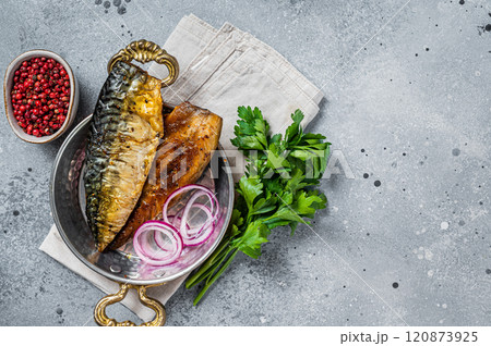 Roasted mackerel soba fish fillet with herbs in a skillet. Gray background. Top view. Copy space Roasted mackerel soba fish fillet with herbs in a skillet. Gray background. Top view. Copy space 120873925