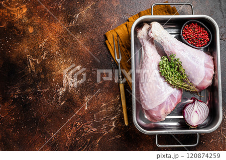 Raw turkey legs Drumsticks, Poultry meat. Dark background. Top view. Copy space 120874259