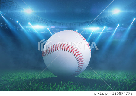 baseball ball lying on grass during tournament at stadium with floodlights. Baseball championship, creative idea 120874775