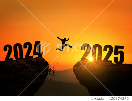 Man jumping on cliff 2025 over the precipice at amazing sunset. New Year's concept. Symbol of starting and welcome happy new year 2025. People enters the year 2025, creative idea Man jumping on cliff 2025 over the precipice at amazing sunset. New Year's concept. Symbol of starting and welcome happy new year 2025. People enters the year 2025, creative idea 120874846