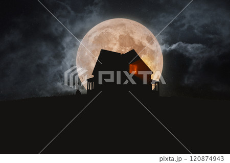 Old scary house with lights from windows on a hill with a cemetery with a full bloody moon with clouds. Happy Halloween, Creative Idea. Scary Wallpaper Old scary house with lights from windows on a hill with a cemetery with a full bloody moon with clouds. Happy Halloween, Creative Idea. Scary Wallpaper 120874943