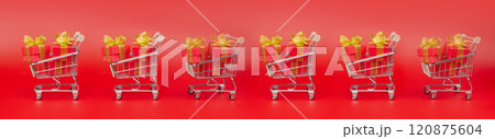 Red long banner with Supermarket trolley, with gifts, purchases. Sale, Discounts, Black Friday, New Year, Christmas, Birthday and Valentines day. 120875604