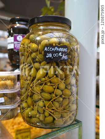 Glass jar with large capers Glass jar with large capers 120875905