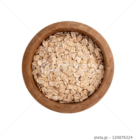 dry rolled oatmeal in bowl isolated 120876324