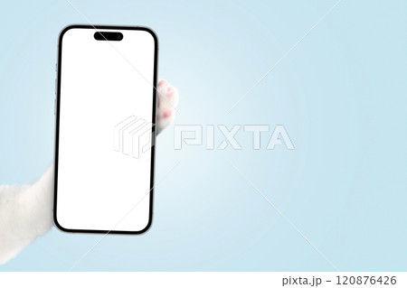 White cat paw holding smartphone mockup on blue background. Creative animal advertising, concept. Application ad and free copy space for design. Funny cat holds a smartphone in its paw and shows 120876426