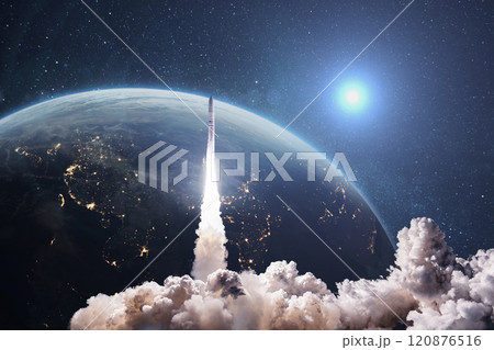 Rocket lift off. Space shuttle with smoke and blast takes off into space on a background of blue planet earth with amazing sunset. Successful start of a space mission. Travel to Mars 120876516