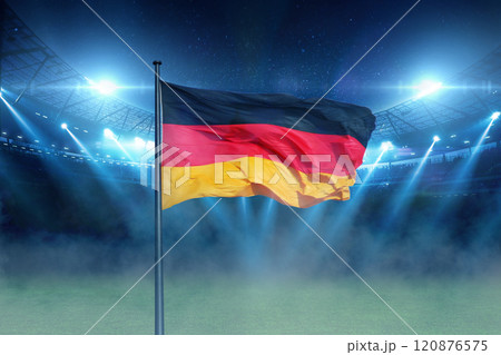 beautiful sports stadium with a green grass field shines with blue spotlights at night with stars. Sports tournament, world championship 120876575