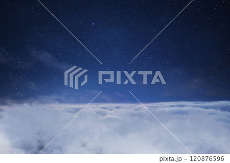 Beautiful starry sky space with clouds, concept. Traveling above the clouds. Flight 120876596