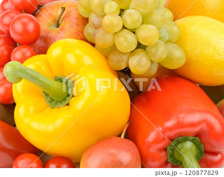Assorted fresh ripe fruits and vegetables. Food background. Assorted fresh ripe fruits and vegetables. Food background. 120877829