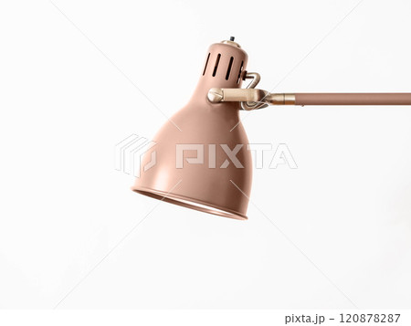 Metal shade lamp with rotary mechanism on white background. Metal shade lamp with rotary mechanism on white background. 120878287