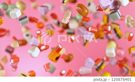 Freeze motion of flying various kind of candies. 120878401