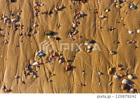 desert sand texture background wallpaper waves of wind, river bank sea shore beach beige natural sand abstract 120879242