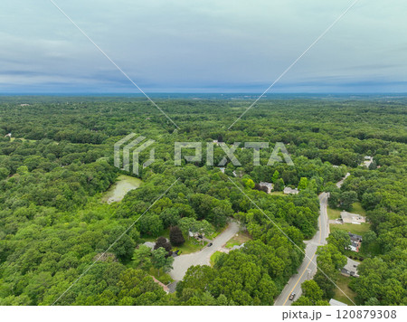 Aerial view of Suburban neighborhood Norfolk County, Massachusetts with green forest, with big villa 120879308