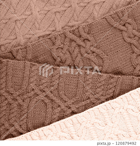 Demonstrating the colors of 2025 - Mocha Mousse. Knitted abstract background in different shades in trendy colors 2025. Large knitted blanket or sweater with pattern. Color concept. Demonstrating the colors of 2025 - Mocha Mousse. Knitted abstract background in different shades in trendy colors 2025. Large knitted blanket or sweater with pattern. Color concept. 120879492