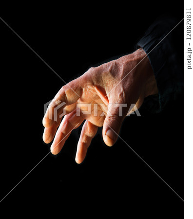 A hand is extended to take A hand is extended to take 120879811