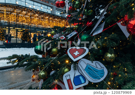 New Year's colorful trees in front of the Central Department Store in Moscow on Kuznetsky Most 120879969