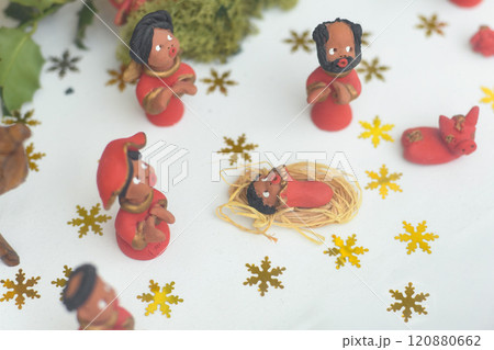 Ceramic red figurines of Joseph Mary and Jesus of a nativity scene Christmas creche Ceramic red figurines of Joseph Mary and Jesus of a nativity scene Christmas creche 120880662